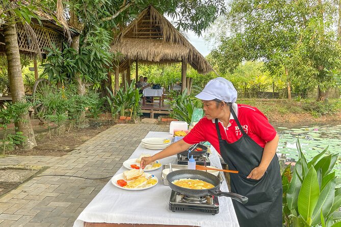 Angkor Sunrise Vespa Tour / Tuk Tuk or Car - Ta Prohm and the trees over stone
