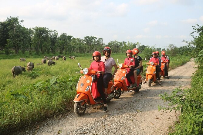 Beautiful Female Riders Vespa Red River Countryside Tour 5 Hours - Why a Vespa is the right way to see Hanoi’s edge