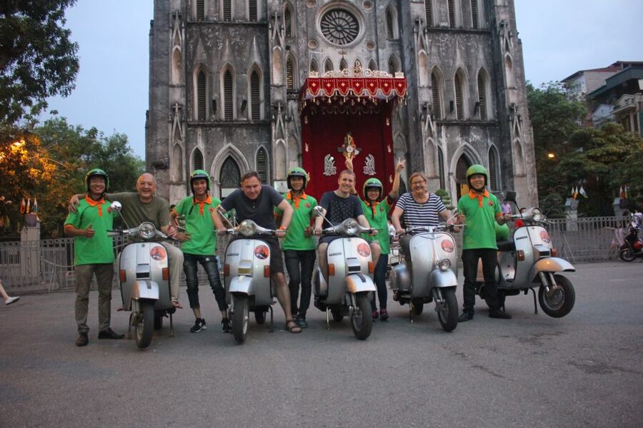 Enjoy Hanoi Like a Local - Vespa & Street Food Tour by Night - French Quarter lights and the Opera House