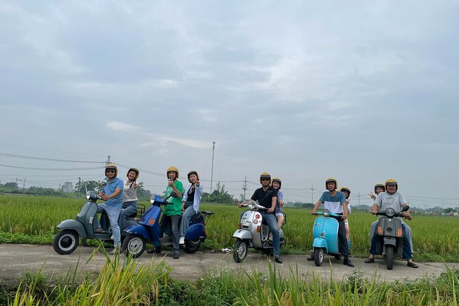 Exploring Vespa Tour Through Little Red River Delta - Crossing Long Biên Bridge
