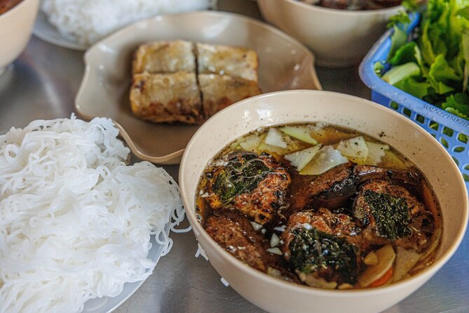 Hanoi After Dark Vespa Tour (4 hours): Street Food & Night Vibes - Hanoi Train Street: A Dramatic Final Stop