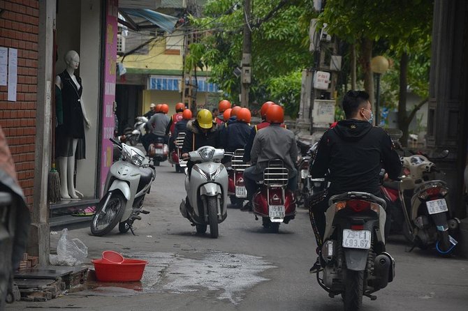 Hanoi Back Streets Vespa Tours: Hanoi Insider Vintage Vespa Tour - Reunification Railway Street and life beside the tracks