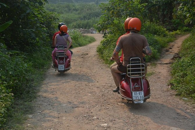 Hanoi By Vespa Tours: HISTORY + CULTURE + SIGHT + FUN 2,5 Hours - Major landmarks from the seat of a Vespa