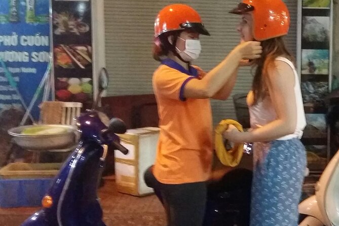 Hanoi Evening Vespa Food Tour 04hrs - Riding Thanh Niên Road between two lakes