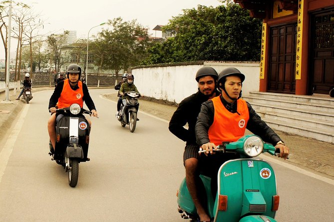 HANOI MUST SEE SITES Vespa Tour - Train Street in a short ten-minute stop