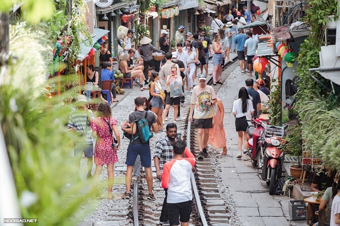 Hanoi Vespa After Dark Street food + Train Street+ Live Music - Long Bien Bridge and the Red River at night