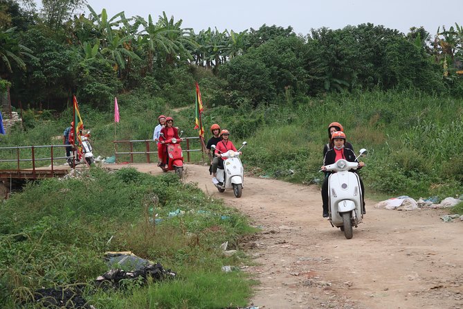 Hanoi Vespa Countryside Tour With Female Ao Dai Riders Half Day - Starting at Hoan Kiem Lake and leaving the Old Quarter