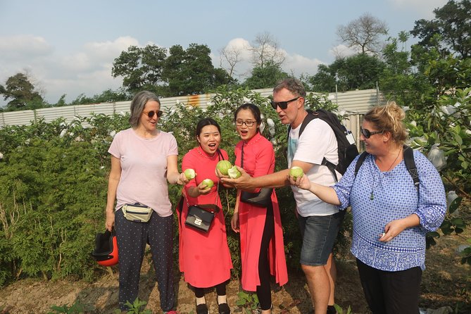 Hanoi Vespa Full Day City & Countryside with Female Ao Dai Riders - Rice roads, Co Loa, and a local market