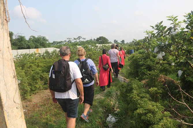 Hanoi Vespa Full Day City & Countryside with Female Ao Dai Riders - Railway homes at Duong Tau