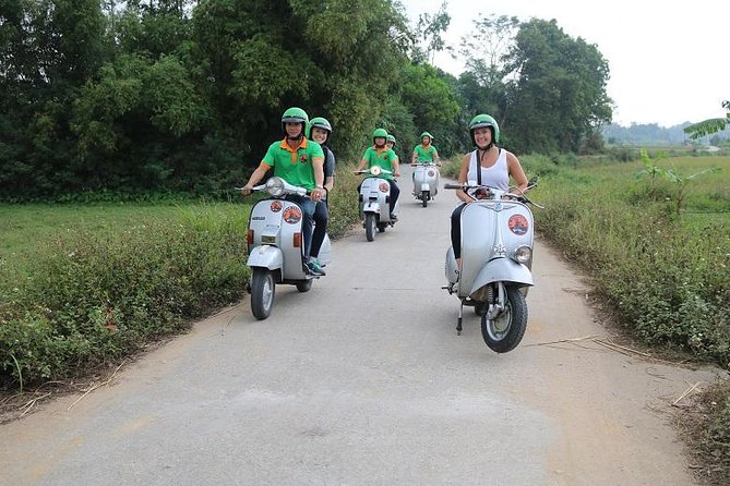 Hanoi Vespa Tour Explore Red River Delta & Rural Villages 5 Hours - Long Bien Bridge gives the tour a strong beginning