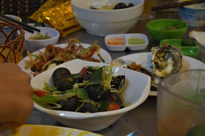 Hanoi Vespa Tours: Hanoi After Dark Vespa Food Tours - Long Bien Bridge and the city after sunset
