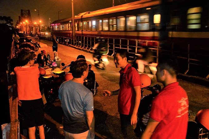 Hanoi Vespa Tours: Hanoi After Dark Vespa Food Tours - What the guides add to the evening