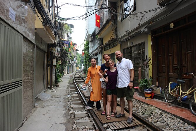 Hanoi Vespa Tours Led By Women: Hanoi Vespa Tour City Half Day - Railway tracks and the Duong Tau stop
