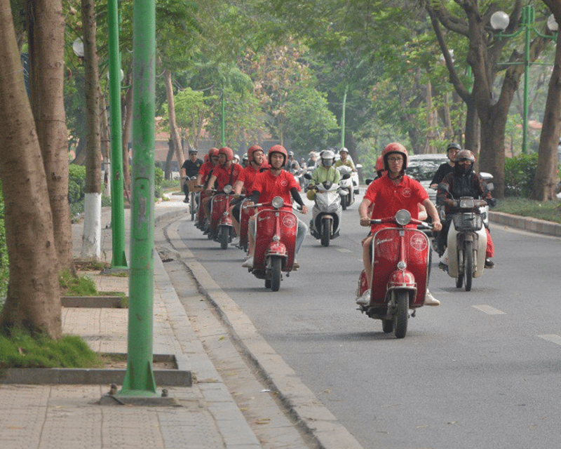 Hanoi Vintage Vespa Tours: A Half-Day Countryside Adventure - Crossing the Red River on Long Bien Bridge
