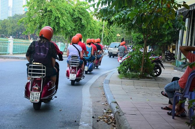 Hanoi Vintage Vespa Tours: HISTORY +FOOD + CULTURE + SIGHT + FUN - Huu Tiep Lake puts wartime history close to home