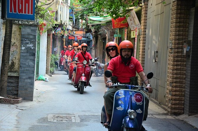 Hanoi Vintage Vespa Tours: HISTORY +FOOD + CULTURE + SIGHT + FUN - Railway Street shows a close-quarters side of Hanoi