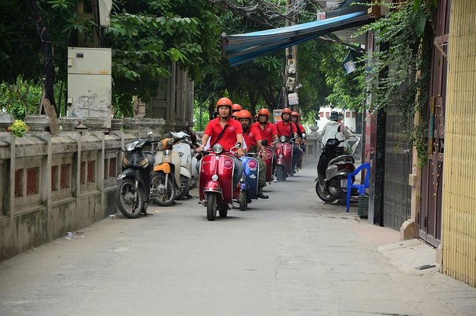 Hanoi Vintage Vespa Tours: HISTORY +FOOD + CULTURE + SIGHT + FUN - Long Bien Bridge links the city to the Red River