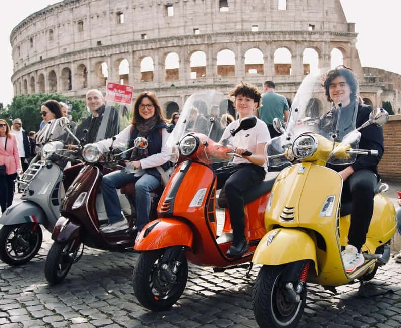 Rome’s Must-See Spots on Vespa (No Driving Needed) - The Colosseum gives the ride its grand opening