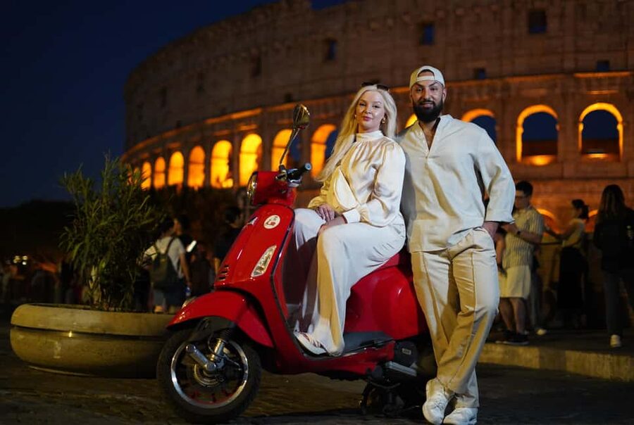 Rome: Vespa Scooter Night Tour with Pro Photographer service - The Colosseum under evening lights