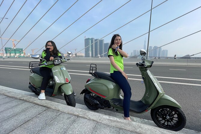 Saigon Morning and Afternoon Adventure by Vespa - Crossing between districts and seeing two Saigons
