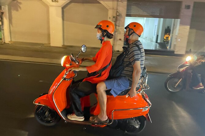 Saigon Vespa By Night Street Food With Female Riders Ao Dai - Seafood and the first taste of local evening life
