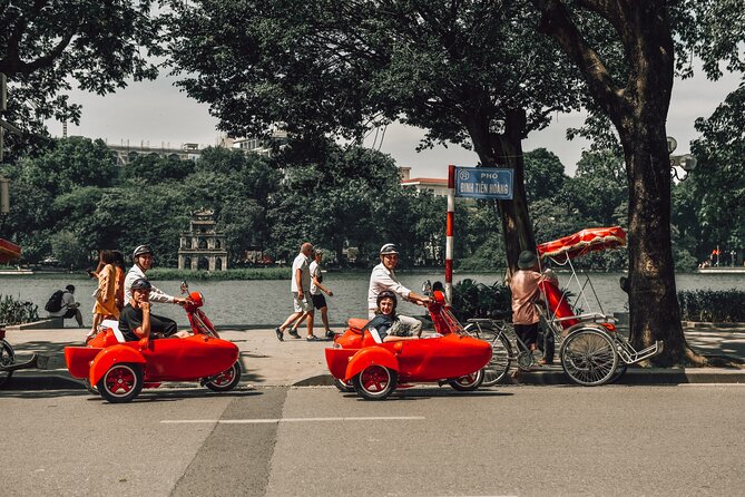 Small Group Vespa Sidecar Tour in Hanoi - O Quan Chuong and Dong Xuan Market