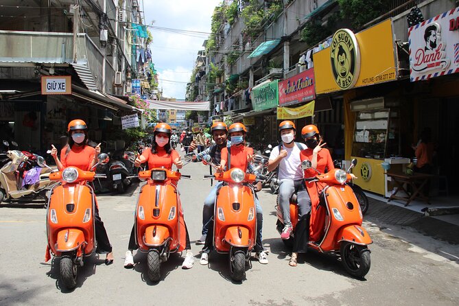 The Insider's Saigon With Female Ao Dai Riders Vespa 4,5 Hours - Ho Thi Ky Flower Market and local trade