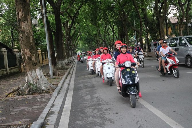 Vespa City Tour &Train Street Female With Ao Dai Riders 4,5 Hours - Why a Vespa is a useful way to see Hanoi