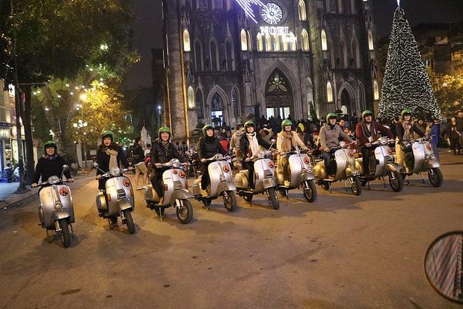 Vespa Saigon By Night Street Food Tour - Riding through central Ho Chi Minh City