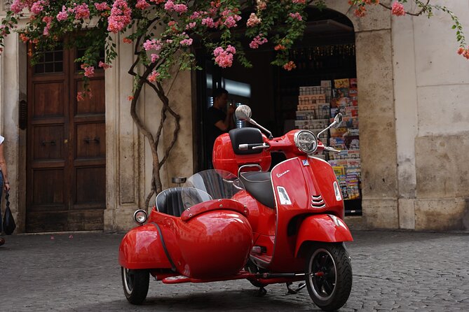 Vespa Sidecar Tour in Rome - The Colosseum, seen quickly from the road