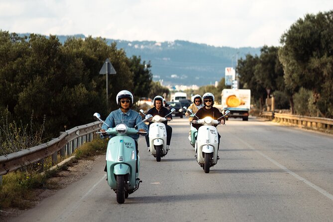 Vespa tour from Polignano to Savelletri with octopus sandwich - Polignano a Mare starts the ride with sea cliffs